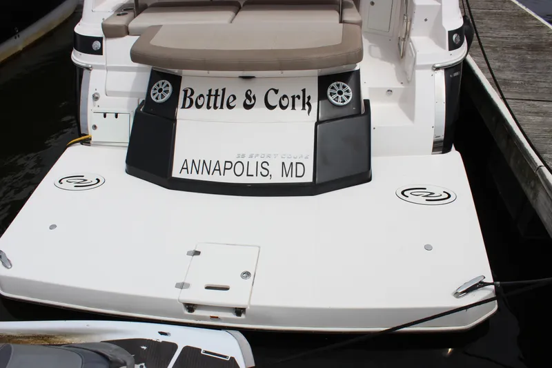 Slide: The Image of 2014 Regal 35 Sport Coupe boat docked in Annapolis, MD, named "Bottle & Cork". - 22