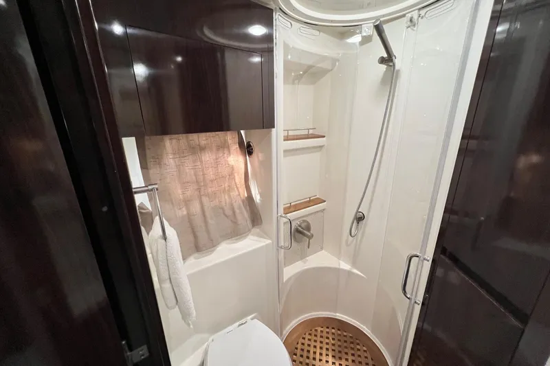 Slide: The Image of Luxurious bathroom in 2017 Sea Ray Sundancer 400 yacht with modern shower and elegant finishes. - 26