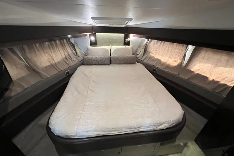 Slide: The Image of Luxurious bedroom interior of 2017 Sea Ray Sundancer 400 yacht with cozy bedding. - 28