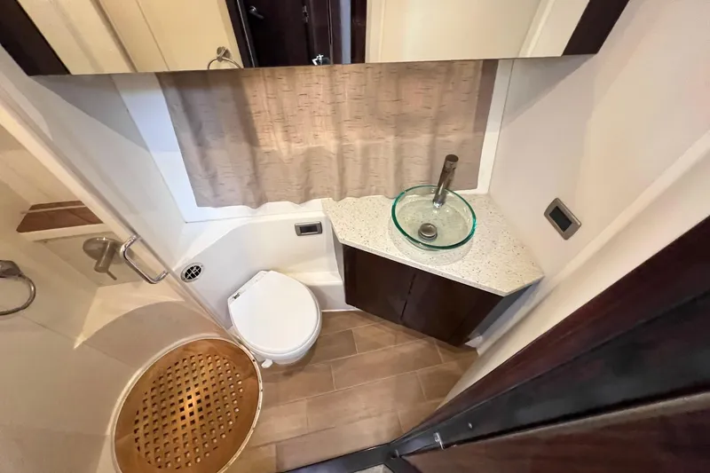 Slide: The Image of Luxurious bathroom in 2017 Sea Ray Sundancer 400 yacht with modern fixtures and elegant design. - 30