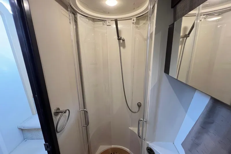 Slide: The Image of Shower area in 2017 Sea Ray Sundancer 400 yacht, featuring modern fixtures and sleek design. - 31
