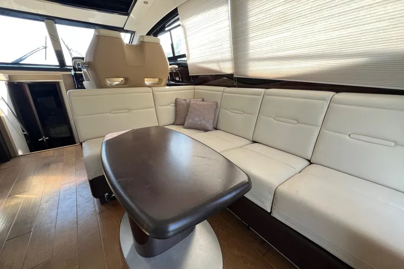 Slide: The Image of Luxurious interior of 2017 Sea Ray Sundancer 400 yacht with plush seating and elegant table. - 35