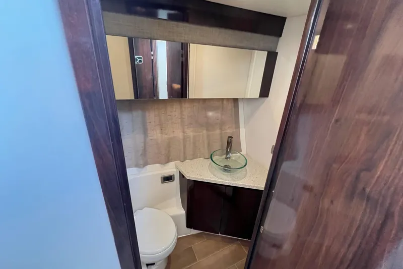 Slide: The Image of Bathroom interior of 2017 Sea Ray Sundancer 400 yacht with modern fixtures. - 40