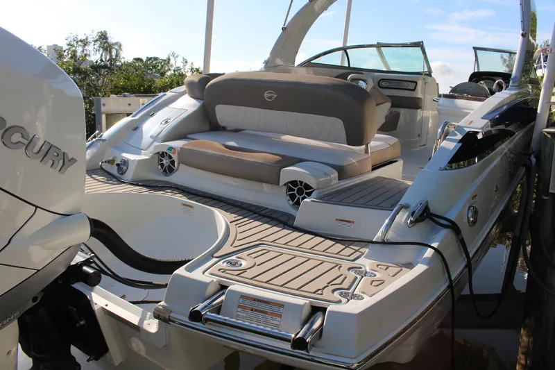 Slide: The Image of 2019 Crownline Eclipse E285 XS boat with spacious seating and modern design. - 2