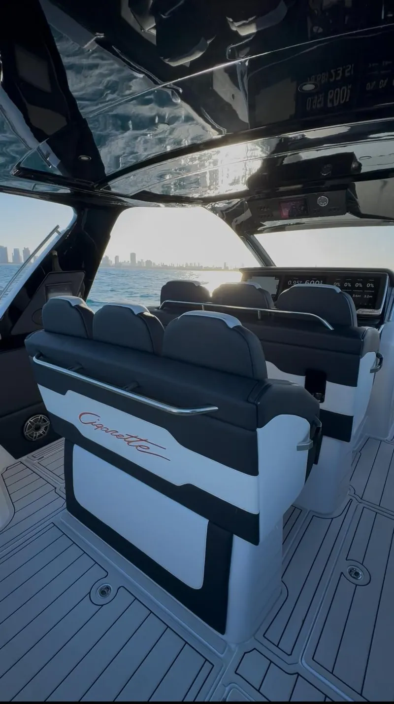 Slide: The Image of Interior of 2024 Cigarette 42 Auroris boat with sleek seating and ocean view. - 2
