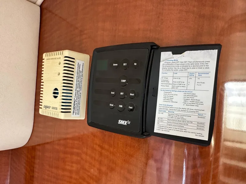 Slide: The Image of Control panel and device on 2003 Sea Ray 320 Sundancer yacht interior. - 40