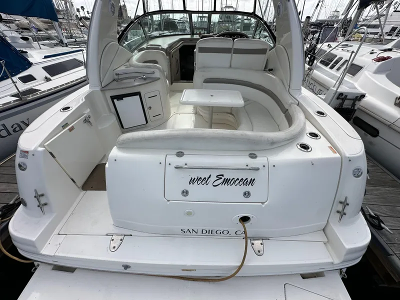 Slide: The Image of 2003 Sea Ray 320 Sundancer boat docked in San Diego marina. - 8