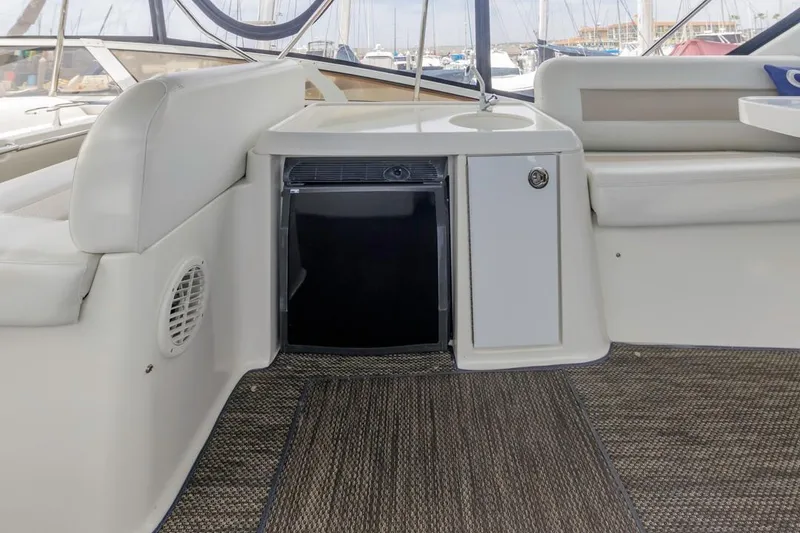 Slide: The Image of 2007 Carver 42 Super Sport yacht interior with seating and storage. - 14