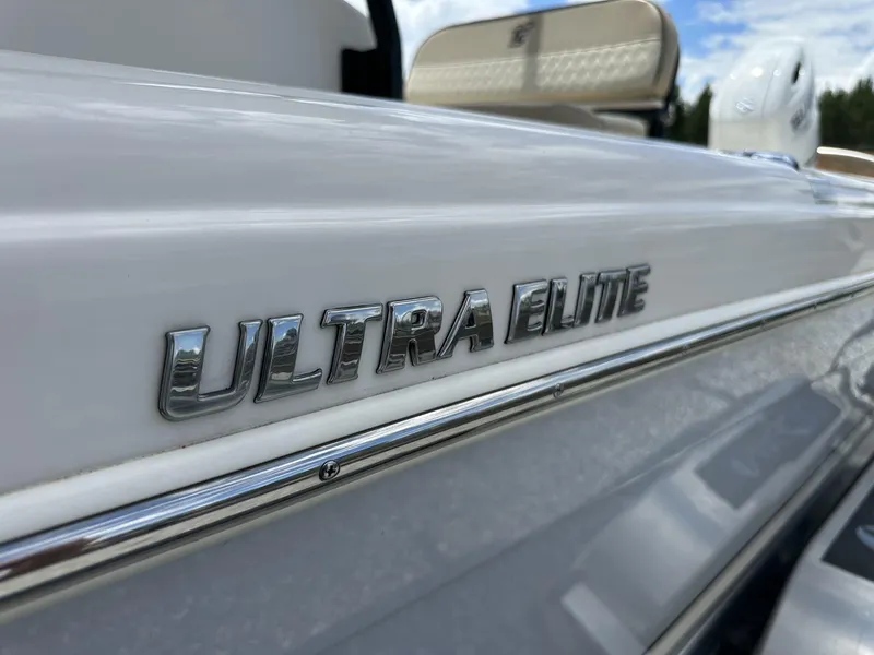 Slide: The Image of Close-up of 2023 Carolina Skiff 23 Ultra Elite boat logo in chrome. - 3