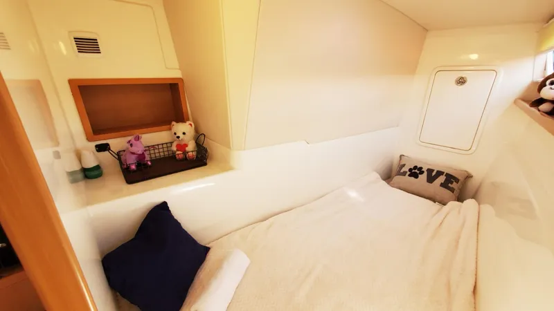 Slide: The Image of Cozy cabin interior of 2025 Smart Cat S280 with plush toys and decorative pillows. - 34
