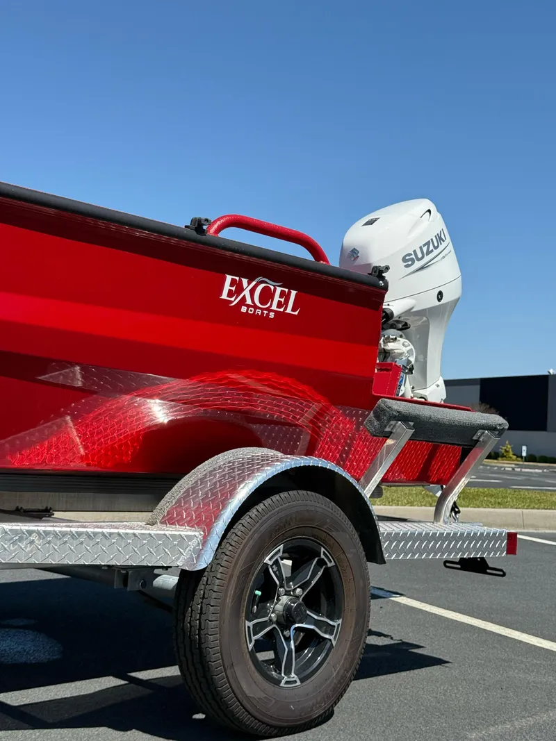Slide: The Image of Red Excel 1751 V4 boat on trailer with Suzuki engine, 2024 model. - 14