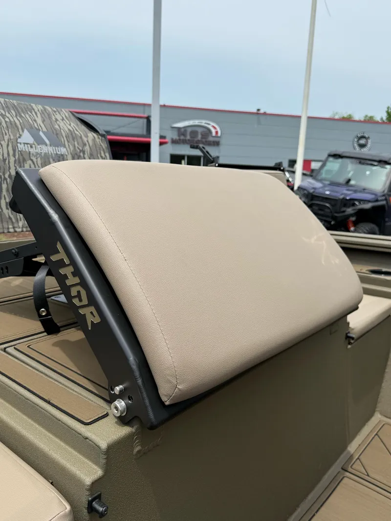 Slide: The Image of 2025 Thor Lake Hammer 1900CC boat seat with beige upholstery and "THOR" branding. - 19