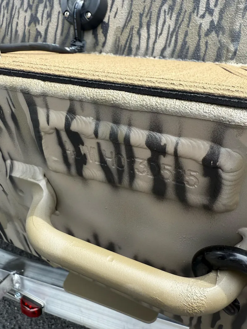 Slide: The Image of 2025 Thor Lake Hammer 1900CC boat with camouflage pattern and sturdy handle. - 21