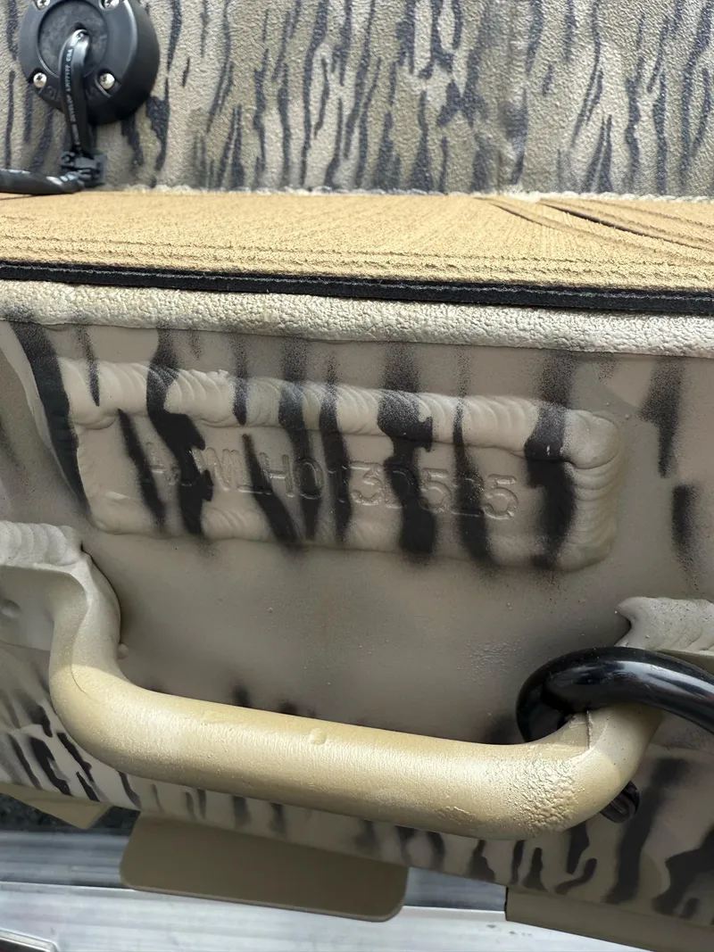 Slide: The Image of Close-up of 2025 Thor Lake Hammer 1900CC boat handle and textured surface. - 22