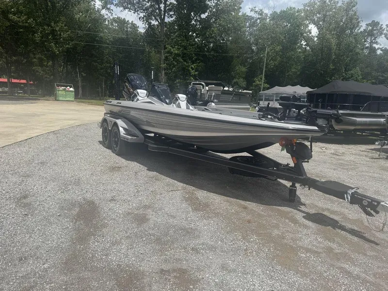 Slide: The Image of 2025 Skeeter FXR20L boat on trailer in outdoor setting. - 1