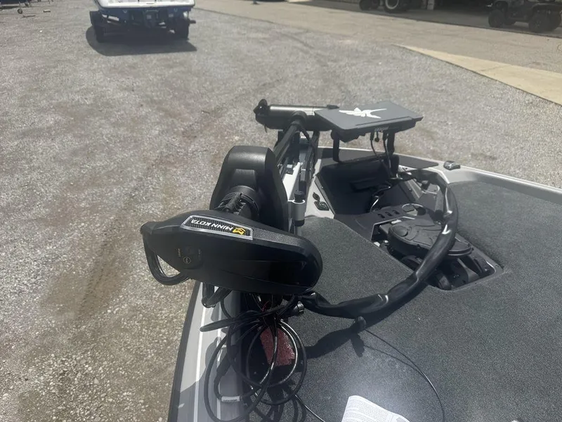Slide: The Image of 2025 Skeeter FXR20L boat with Minn Kota trolling motor on deck. - 8