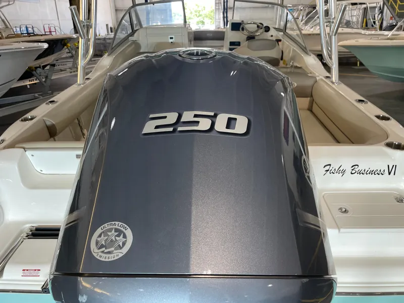 Slide: The Image of 2024 Key West 239 DFS boat with 250 horsepower engine in showroom. - 15
