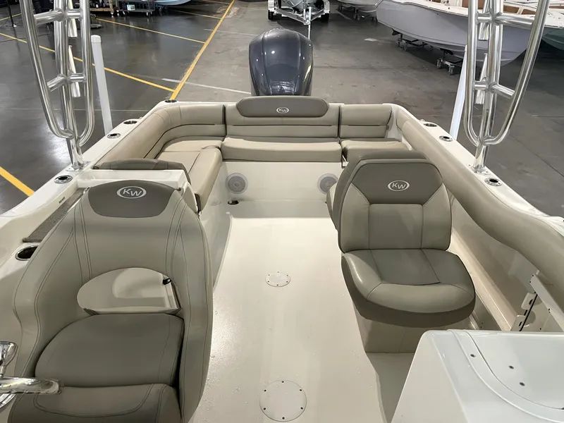 Slide: The Image of 2024 Key West 239 DFS boat interior with beige seating and spacious layout. - 20