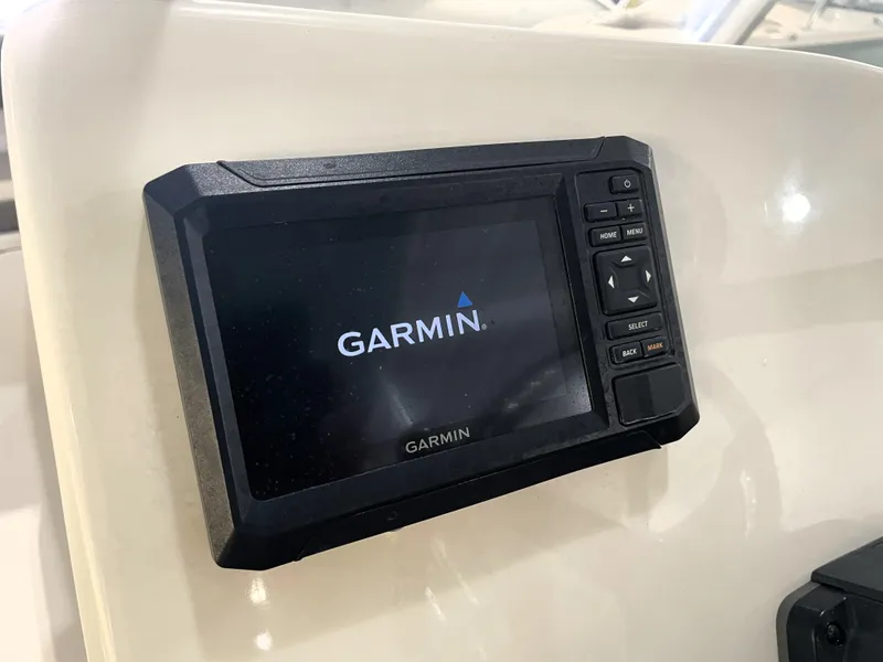 Slide: The Image of Garmin navigation system on 2024 Key West 239 DFS boat dashboard. - 25
