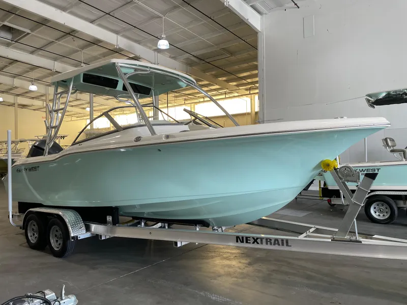 Slide: The Image of 2024 Key West 239 DFS boat on trailer in indoor storage facility. - 4