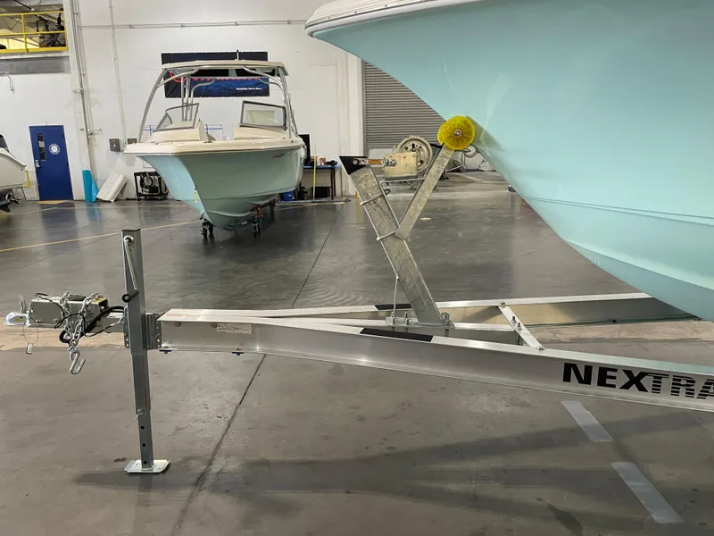 Slide: The Image of 2024 Key West 239 DFS boat on trailer in warehouse setting. - 41