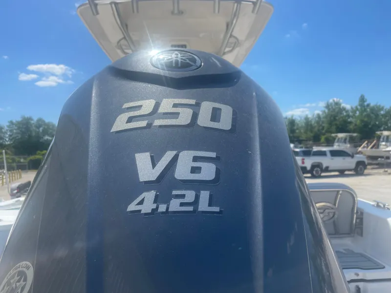 Slide: The Image of Outboard motor on 2023 Sea Fox 228 Commander, 250 V6 4.2L engine, sunny day. - 15