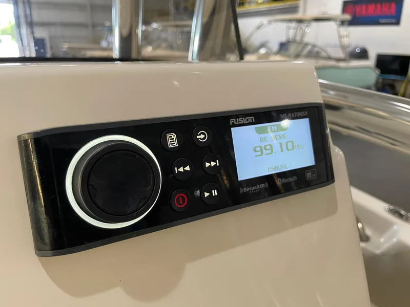 Slide: The Image of Fusion marine stereo on 2023 Key West 203 FS boat, displaying FM 99.10 MHz. - 26