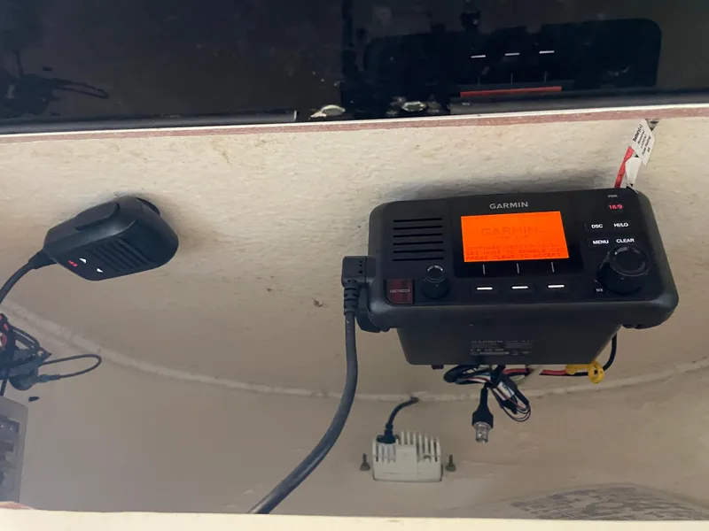 Slide: The Image of 2023 Key West 203 FS boat with Garmin marine radio and speaker system. - 29