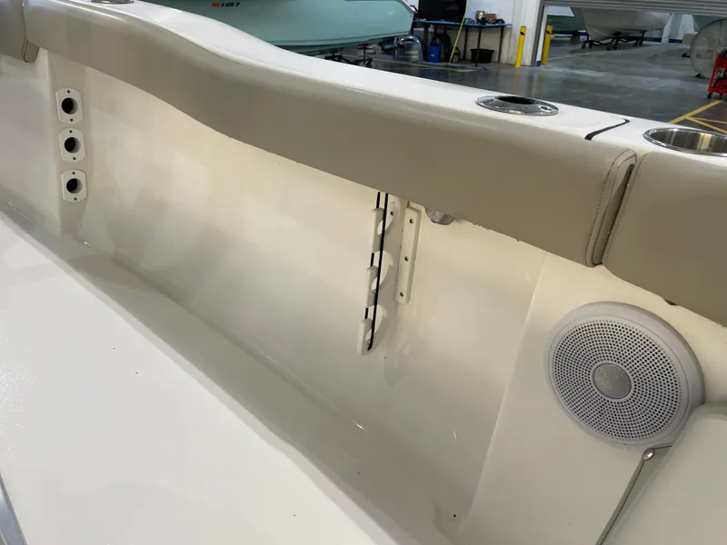 Slide: The Image of 2023 Key West 203 FS boat interior with cup holders and speaker. - 36