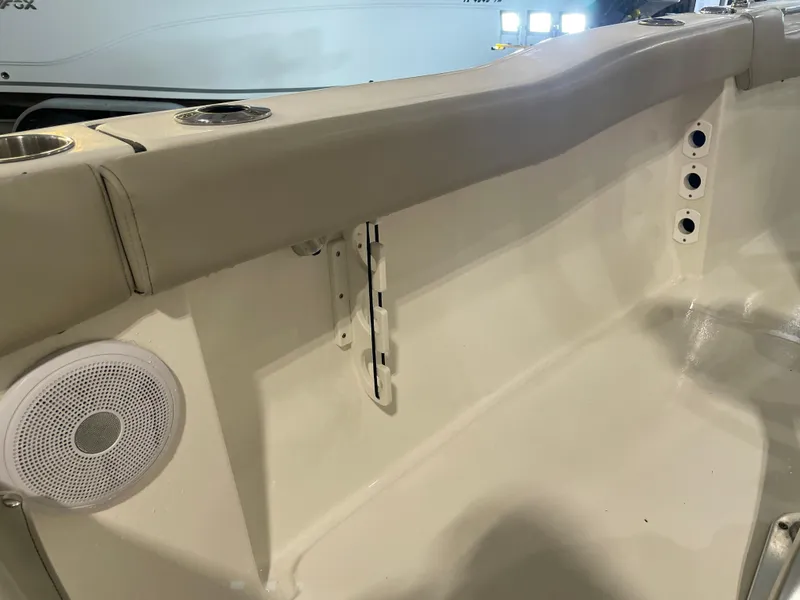 Slide: The Image of 2023 Key West 203 FS boat interior with speaker and cup holders. - 37