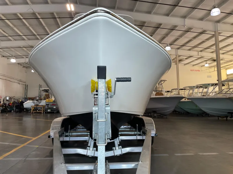 Slide: The Image of 2023 Key West 203 FS boat on trailer in indoor showroom. - 7