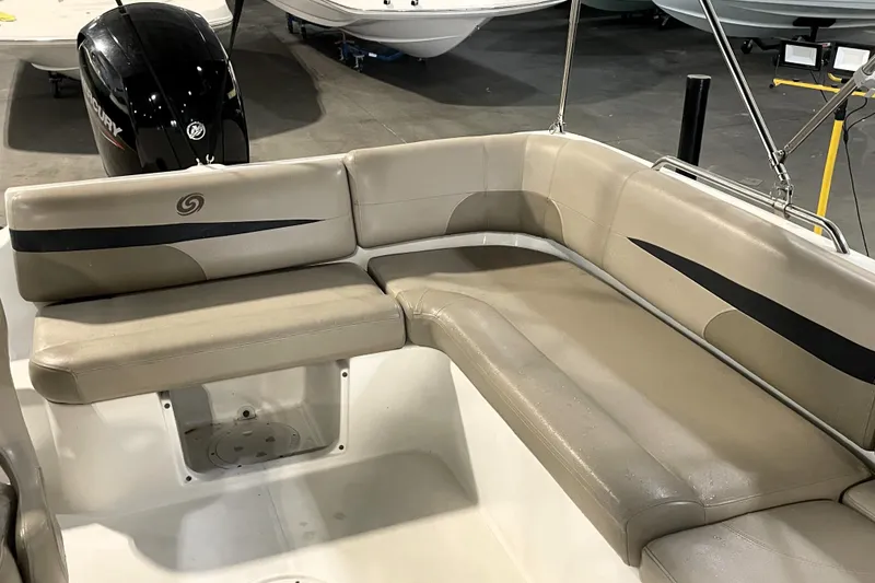 Slide: The Image of Control panel of 2022 Hurricane SunDeck Sport 201 OB boat with switches and audio system. - 23