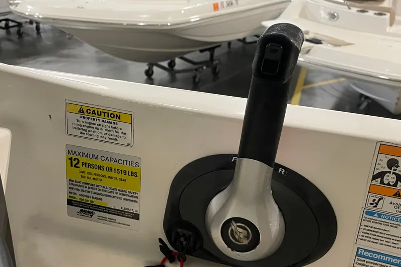 Slide: The Image of 2022 Hurricane SunDeck Sport 201 OB boat on NexTrail trailer, side view. - 28