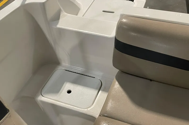 Slide: The Image of Trailer wheel of 2022 Hurricane SunDeck Sport 201 OB on asphalt surface. - 29