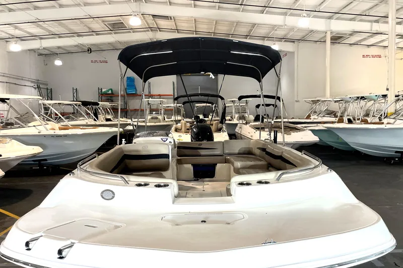 Slide: The Image of 2022 Hurricane SunDeck Sport 201 OB boat on Nextrail trailer, viewed from the front. - 9