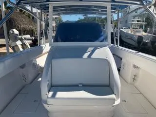 Slide: The Image of 2016 Intrepid 400 Center Console boat interior with seating and helm. - 16