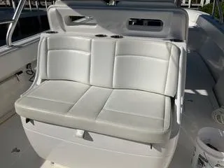 Slide: The Image of 2016 Intrepid 400 Center Console boat with white cushioned seating. - 19