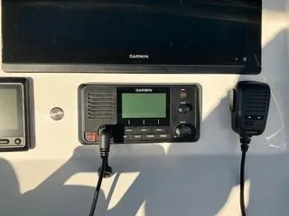 Slide: The Image of Garmin marine electronics on 2016 Intrepid 400 Center Console dashboard. - 5