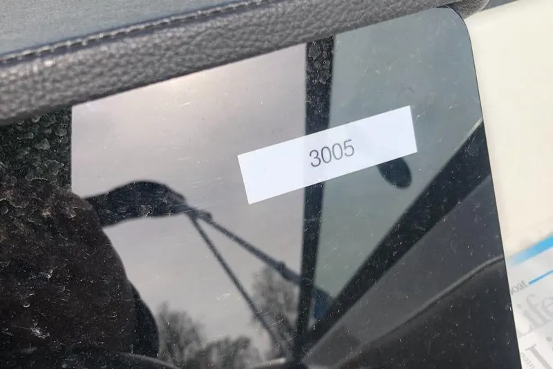 Slide: The Image of Close-up of Sea Ray SPX 230 OB dashboard with label '3005', 2022 model. - 11