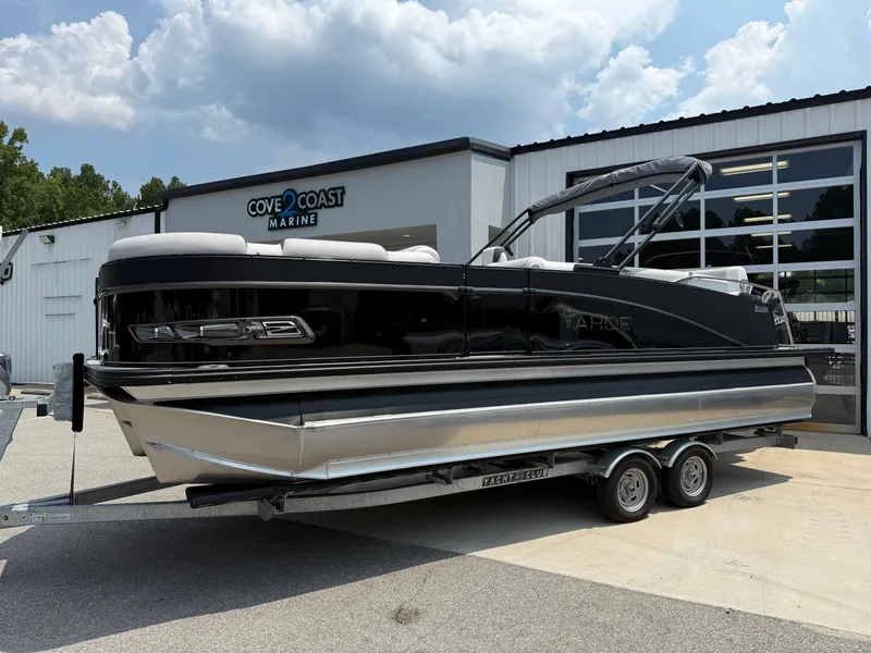 The Image of 2025 Tahoe Pontoon Cascade Cruise Rear Bench on trailer at Cove 2 Coast Marine. - 0