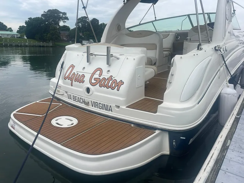 Slide: The Image of 2008 Sea Ray 280 Sundancer boat docked, featuring "Aqua Gator" name, Virginia Beach. - 39
