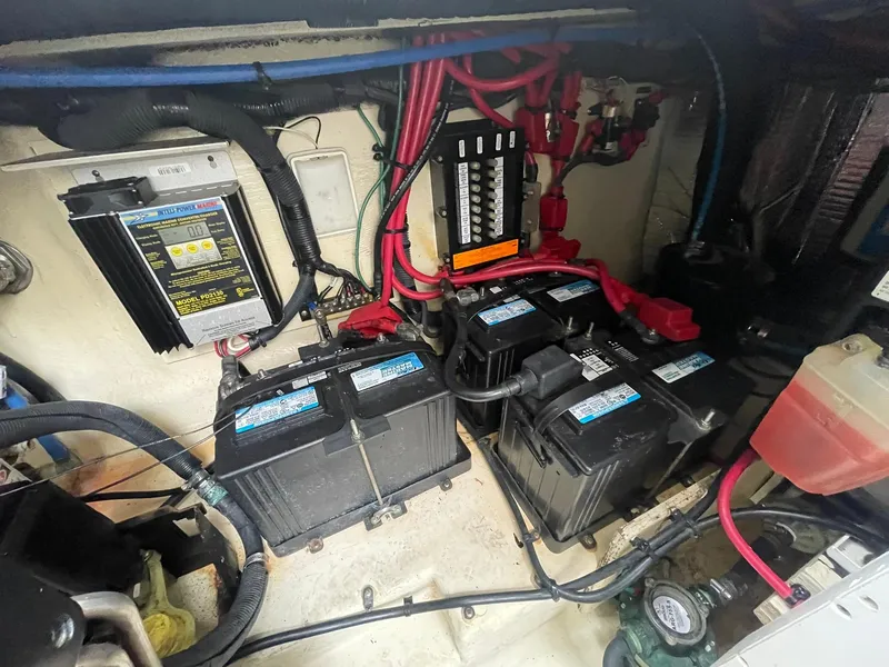 Slide: The Image of Engine compartment of 2008 Sea Ray 280 Sundancer with batteries and wiring. - 45