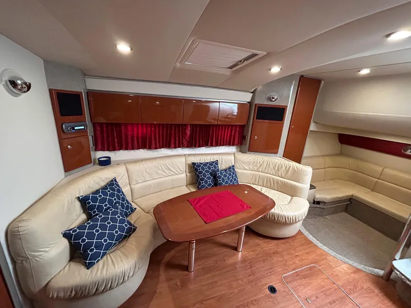Slide: The Image of Luxurious interior of a 2007 Formula 40 PC yacht with plush seating and elegant decor. - 21