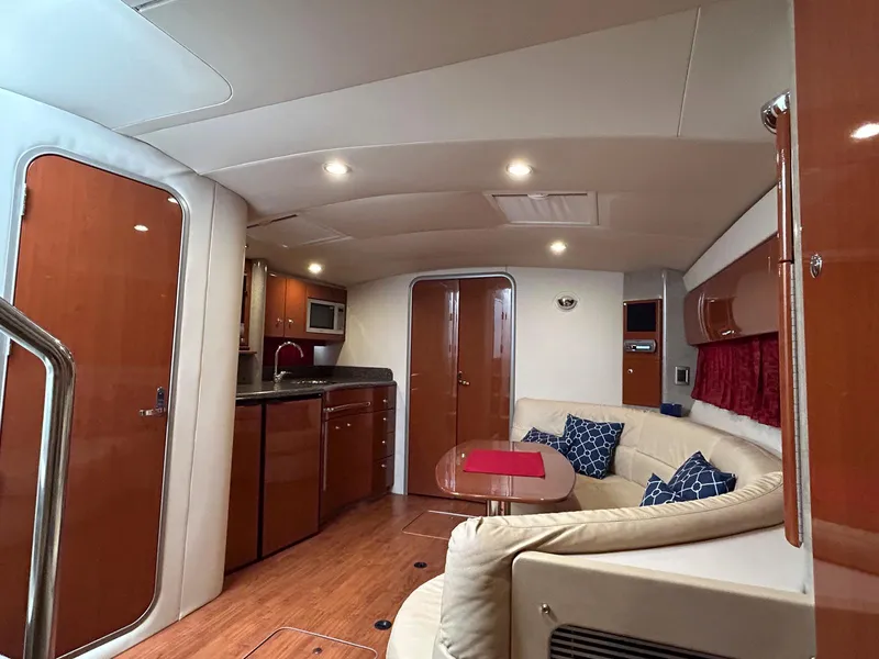 Slide: The Image of Luxurious interior of a 2007 Formula 40 PC yacht with modern kitchen and seating area. - 22