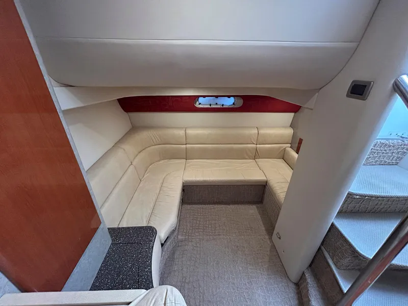 Slide: The Image of Interior of 2007 Formula 40 PC yacht with beige seating and modern design. - 25