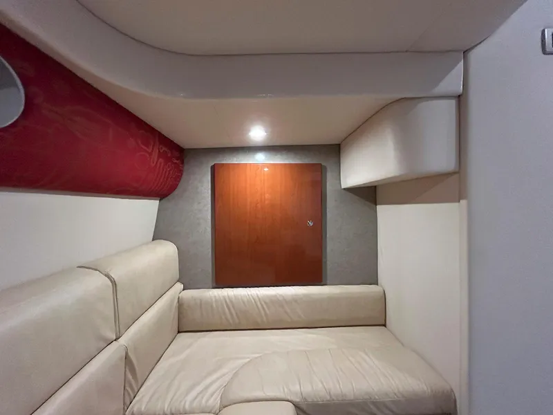 Slide: The Image of Interior of 2007 Formula 40 PC yacht with beige seating and wooden accents. - 26