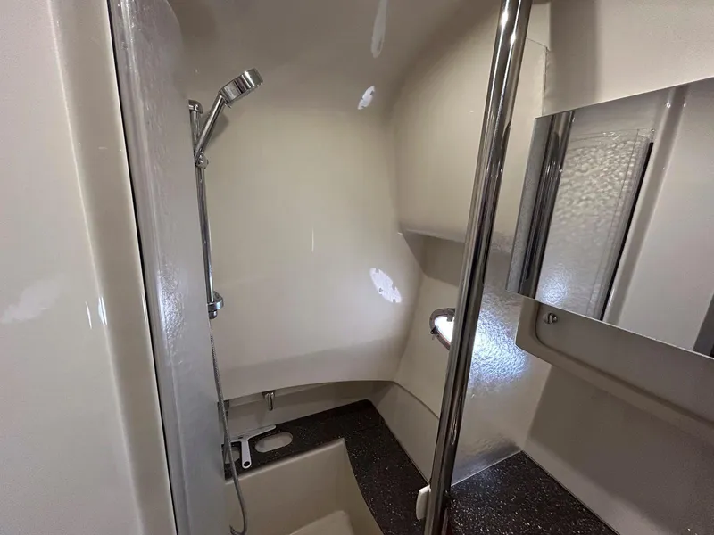 Slide: The Image of 2007 Formula 40 PC yacht bathroom with shower, mirror, and sleek design. - 31