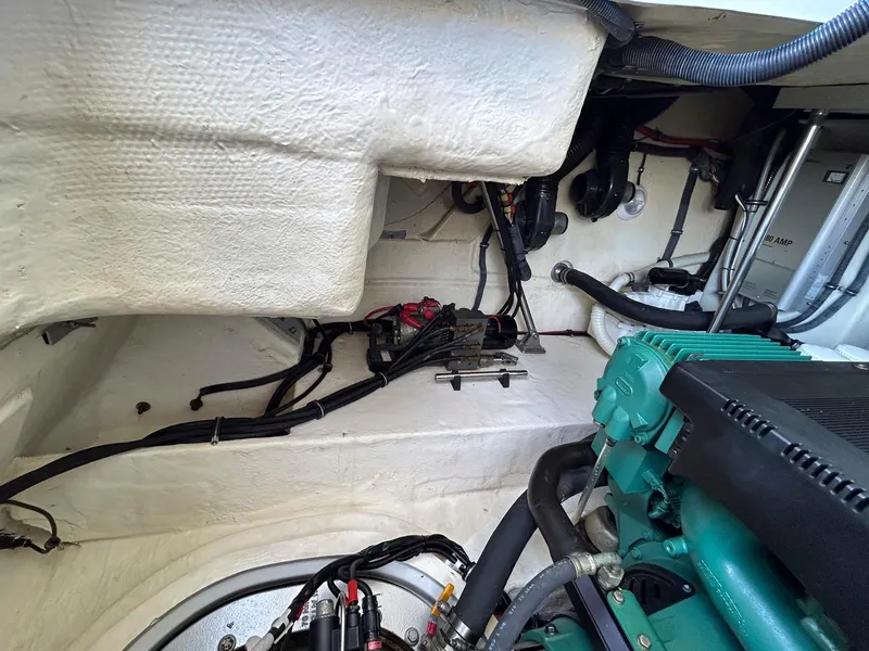 Slide: The Image of Engine compartment of a 2007 Formula 40 PC boat, showcasing mechanical components. - 37