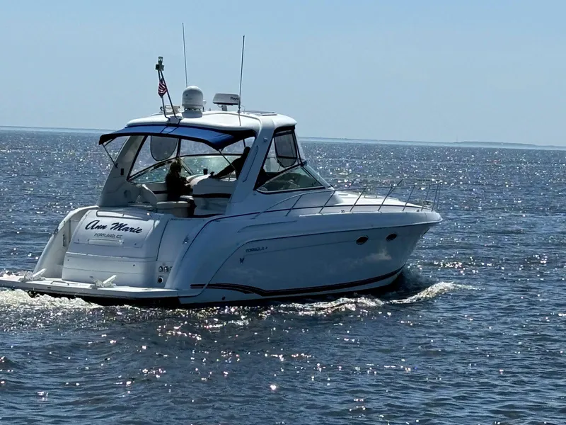 Slide: The Image of 2007 Formula 40 PC yacht cruising on open water under clear skies. - 4