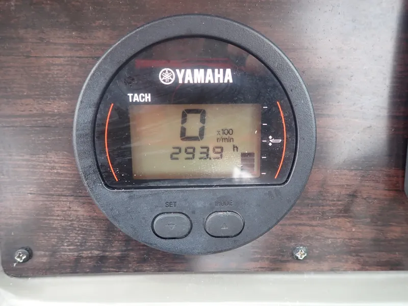 Slide: The Image of Yamaha tachometer displaying 293.9 hours on a 2016 Hurricane SunDeck 2690 OB boat. - 14